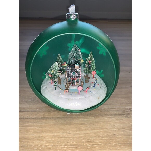 Animated Lighted Musical Ornament Plastic Gingerbread House Green Countertop - Picture 1 of 9